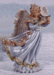 A beautiful angel in blue plays her harp from atop a mound of clouds. An Avery Creation exclusive.